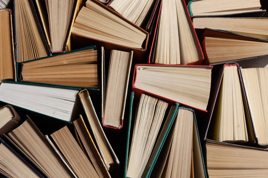 Old and well used hardback books or text books with copy space