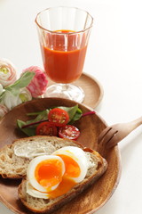 soft boiled egg on cream cheese toast for gourmet comfort breakfast