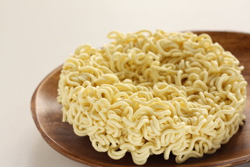 Instant ramen noodles on plate for unhealthy food ingredient 