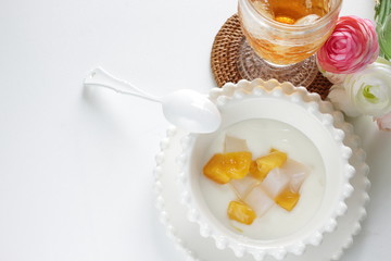 Obraz na płótnie Canvas Mango and nada de coco in yogurt for healthy dessert