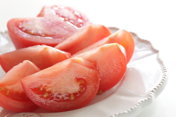 Freshness cut tomato on dish for healthy food ingredient