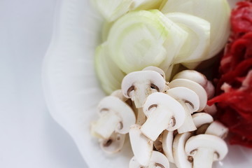 Raw food ingredient, beef and onion with sliced mushroom,
