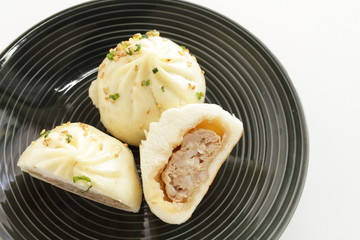 Chinese food, dumping Sheng Jian Bao pan fried meat bun