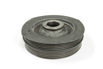 Old crankshaft pulley on white background, isolated, Car maintenance service.