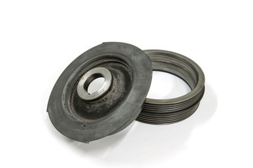 Old crankshaft pulley on white background, isolated, Car maintenance service.