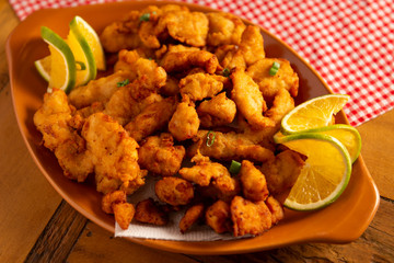 portion made of breaded chicken breast strips