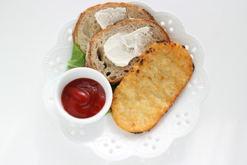 Hashed brown fried potato and bread
