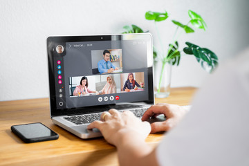 Fototapeta premium businessman colleagues in remote video call conference discussing plans and company future strategies, working at home office during quarantine isolation distancing of coronavirus COVID-19 pandemic