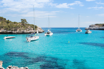 Fototapeta na wymiar Sea landscape with boats in Santanyi, Majorca