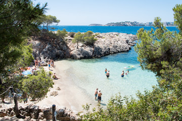 Beach with people and sea landscape in Punta Negra, Calvia, Majorca