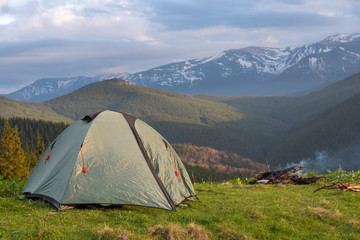 hiker with equipment spends time hiking in the mountains