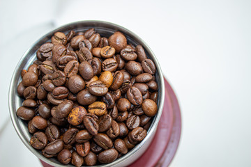 Closeup picture of coffee bean grinder and coffee bean