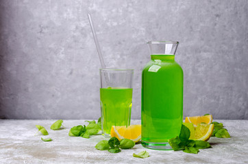 Green liquid in a glass bottle