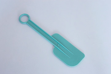 spatula blue on white background