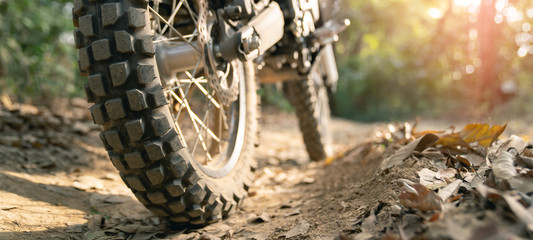 A part of a dirt road dirt bike in the forest