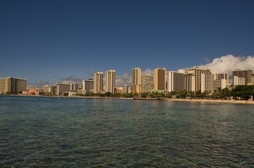 Skyline of Honolulu as seen from Waikiki beach in Hawaii, USA