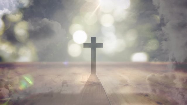 Animation of a cross on a blue sky with points of defocused light