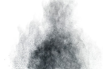 Black powder splatter background.Dust particles texture.