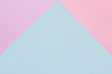 Abstract geometric pastel background in pink and blue colors with copy space