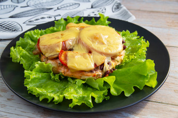 Baked chicken with mushrooms and vegetables and cheese with herbs