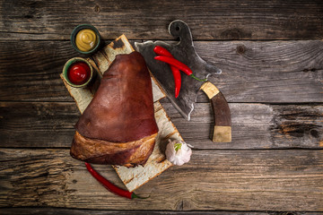 Big smoked pork knuckle, delicious food, appetizer. Bavarian grilled knuckel of pork - German Pork...