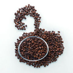 roasted coffee beans in the shape of an apple, a glass bowl filled with grains in the middle