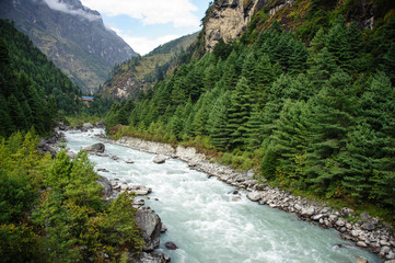 Fototapeta na wymiar Natural upper stream on the path to Everest Base Camp