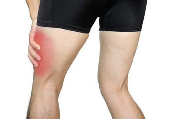 Black and white picture .Knee pain .man stand hand caught at the knee.  health concepts