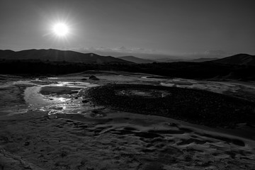 muddy volcanoes and active lava