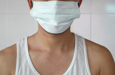 Doctor wearing protection face mask against virus fever.
