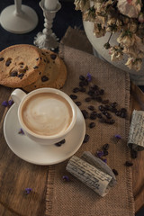 Cup of coffee with chocolate chip cookies