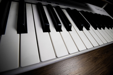 Naklejka premium Detail of black and white keys of a piano