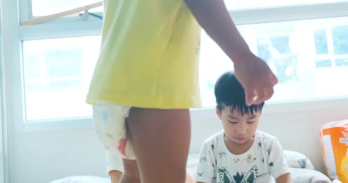 Adorable boy and girl kid group playing toy in cozy room developement preschool education