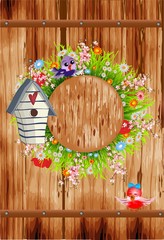  composition with a birdhouse, which is hung by a wreath of grass and flowers