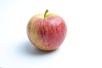 One pink apple on a white background
