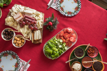 New Year Breakfast at home. Homemade Breakfast with family with red background. Traditional Turkish Breakfast. ( Selective focus)