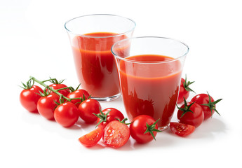 Tomato juice and tomatoes placed on a white background