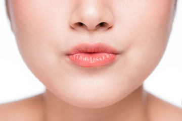 Young asian woman close up. Perfect natural lip makeup
