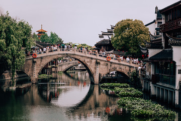 Suzhou - May 1, 2017:  Tourists enjoy the Venice of the east - traditional chinese village of Suzhou