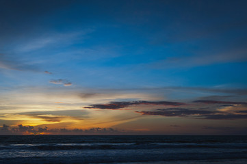Naklejka na ściany i meble Magical dramatic sunset on a tropical beach.