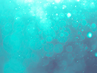 Blue dark bokeh background. Blurry glittering diamonds wallpaper.