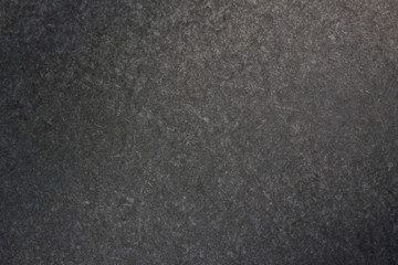 Obraz premium Tekstura starej szarej ściany na czarnym tle, czarne tło i tekstura, szaro-czarna tekstura ściany