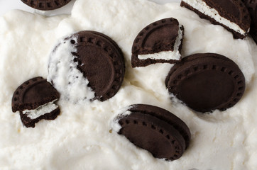 Top view of yummy dark double cookies and soft sweet creme