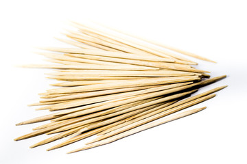a bunch of toothpicks on a white background