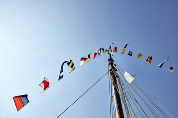 Waving flags on a fisher boat