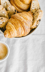 Croissants, biscottis and coffee. Breakfast concept. 