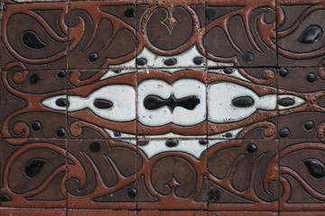 decoration of tiles on the wall of an old school