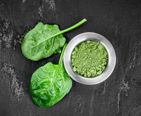 Homemade spinach powder (close up; selective focus)