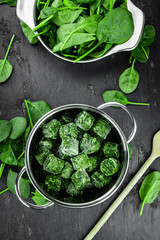 Portion of frozen spinach (close up; selective focus)