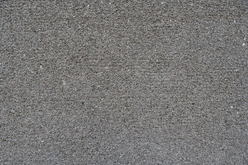 Decorative cement plaster. Sharp irregularities. Back background.
